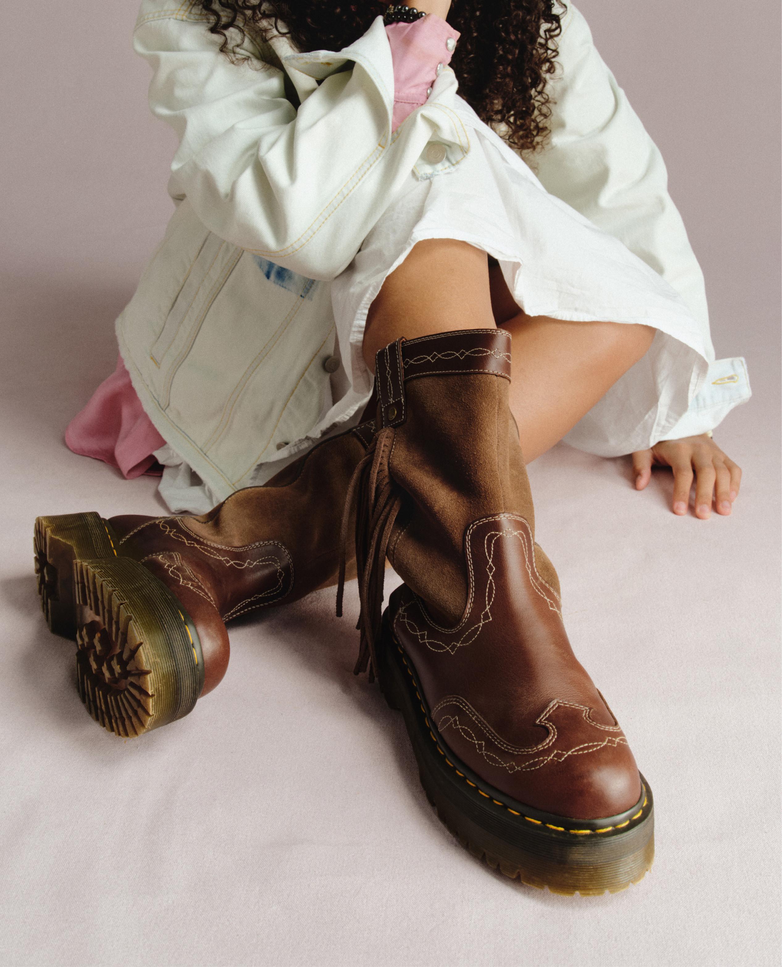 Brown leather biker boots with western stitching, fringe panels and yellow welt stitch