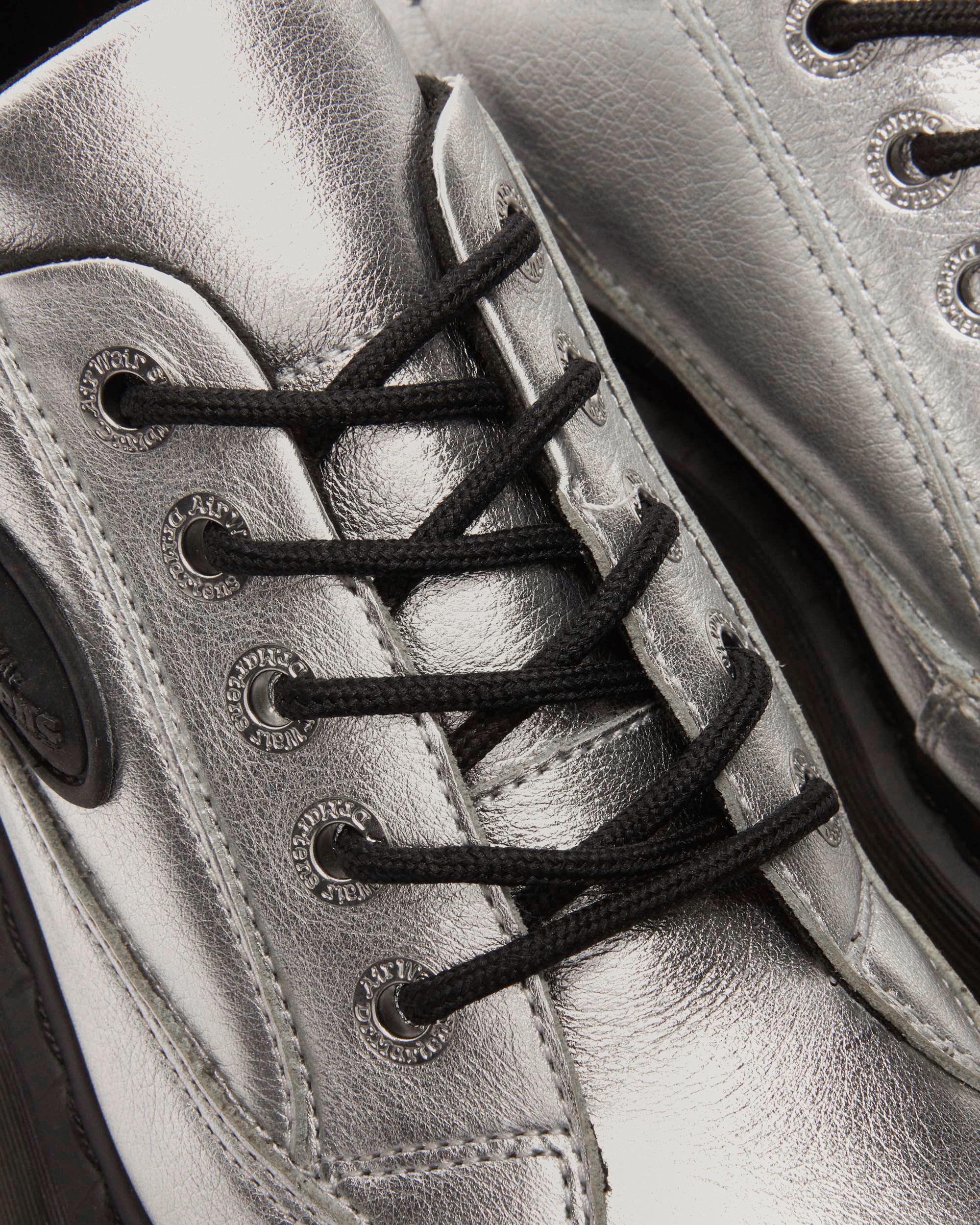 Zapatos Buzz de piel metalizada con 5 ojales