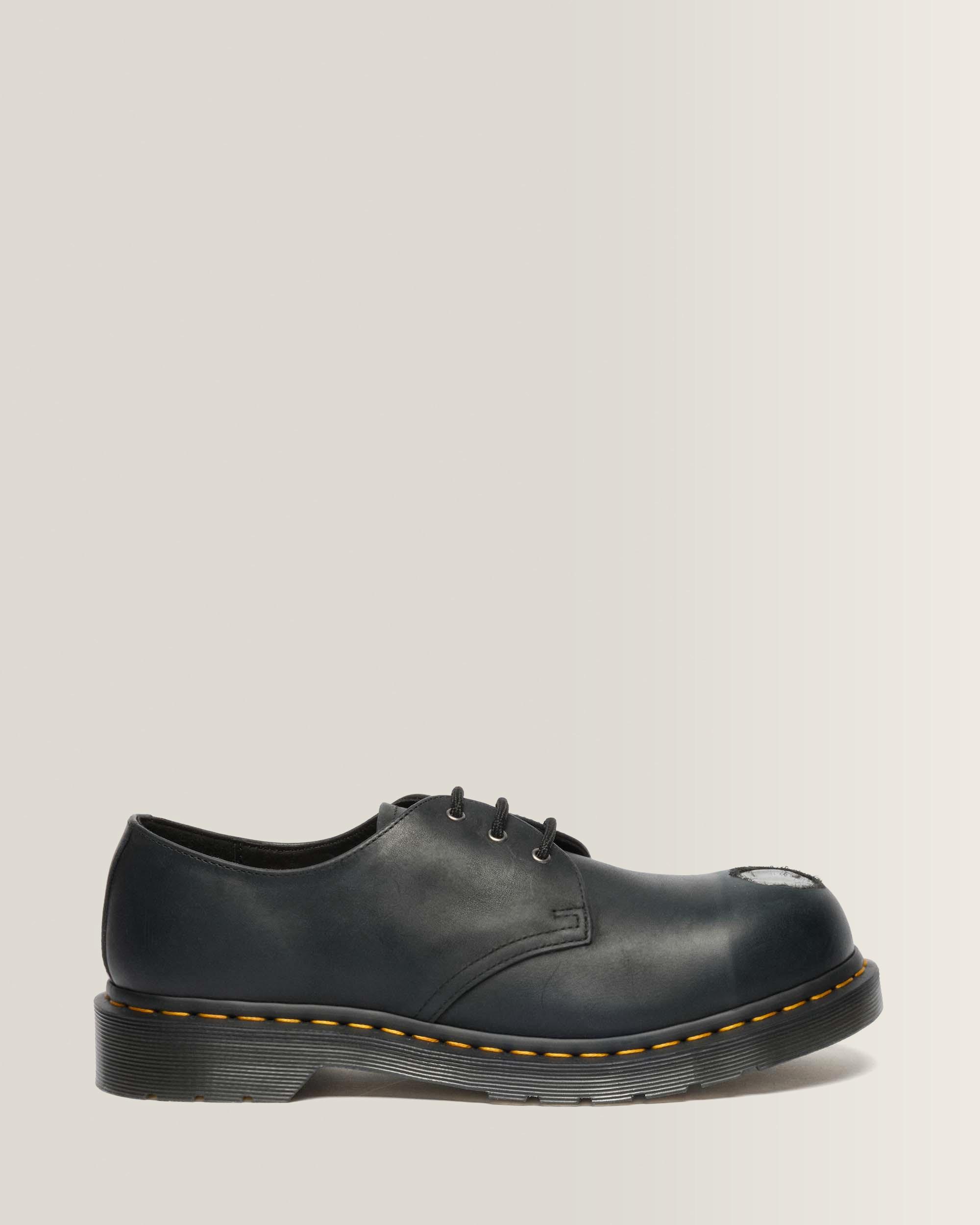 Scarpe 1461 in pelle con puntale in metallo
