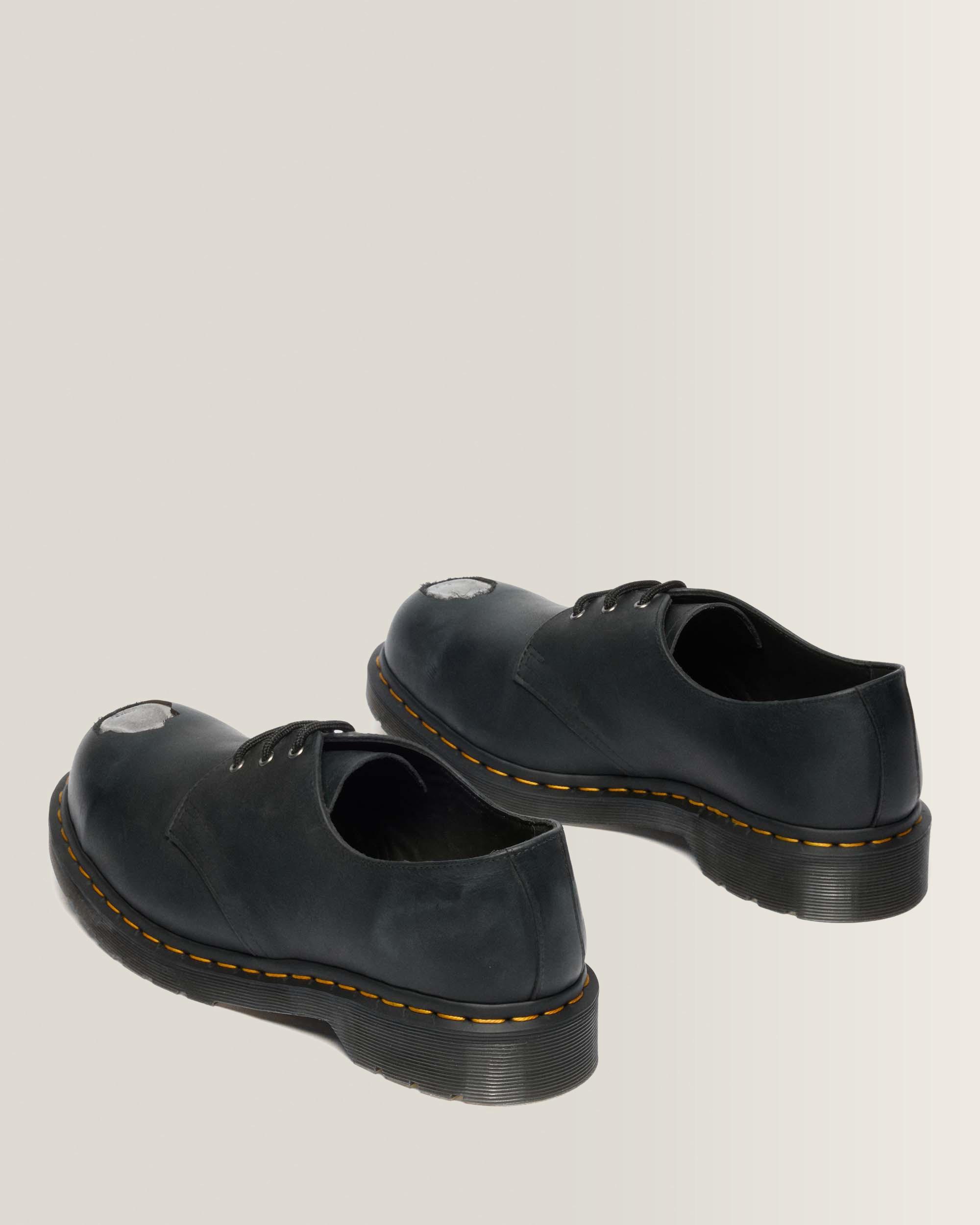 Scarpe 1461 in pelle con puntale in metallo