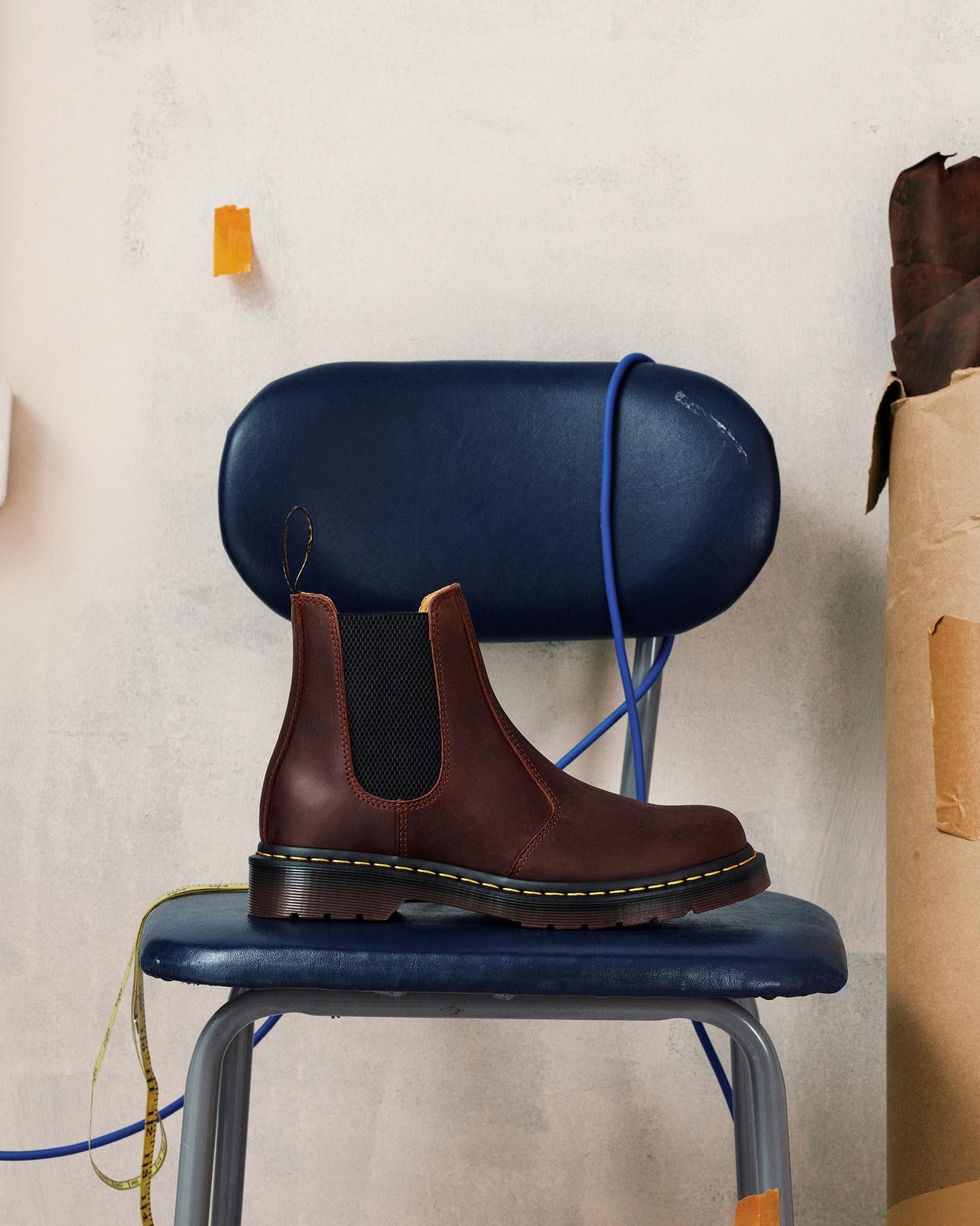 Burgundy leather Chelsea boot with black elastic gusset and yellow welt stitching