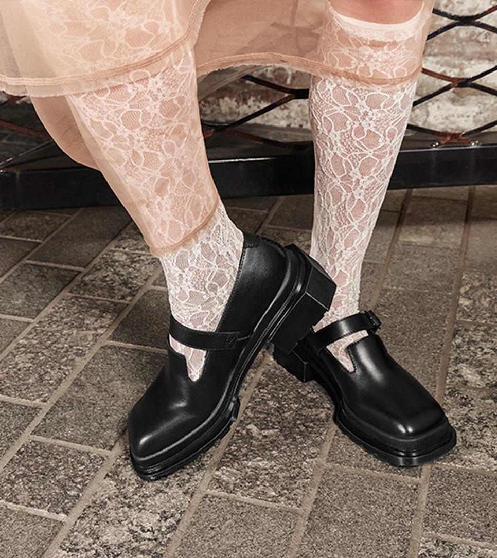 Dr. Martens black square toe mary jane shoes with white socks