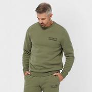 Man wearing green loungewear set.