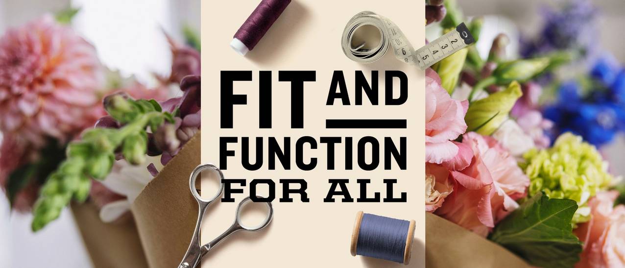 Fit and function for all. A variety of tools for making clothes, a scissors, thread, and a measuring tape, are on top of a bright image of flowers. 
