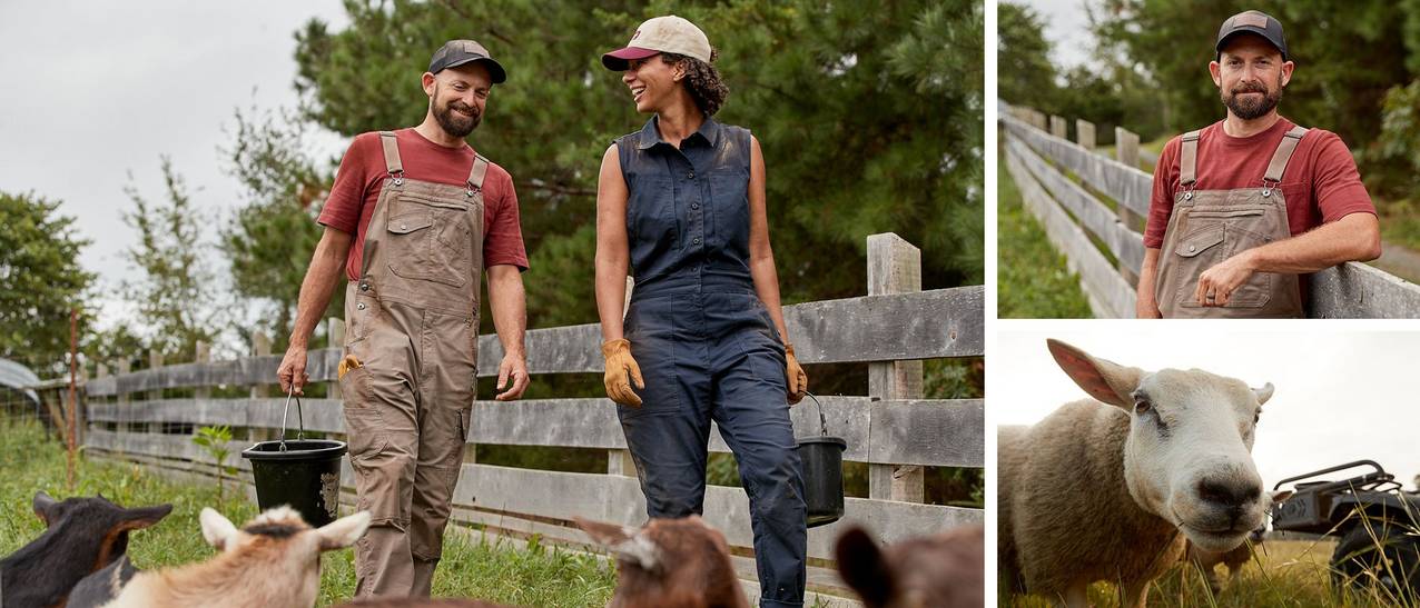 Dan and Shankari wearing duluth products while feeding their goats