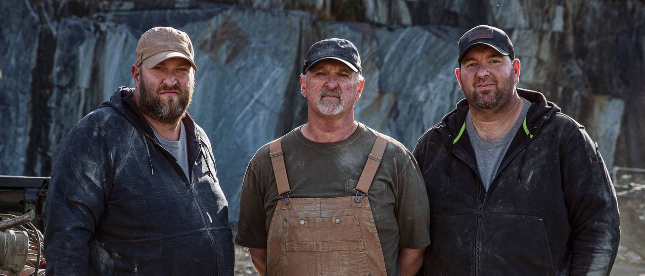 Kruowski men standing next to each other