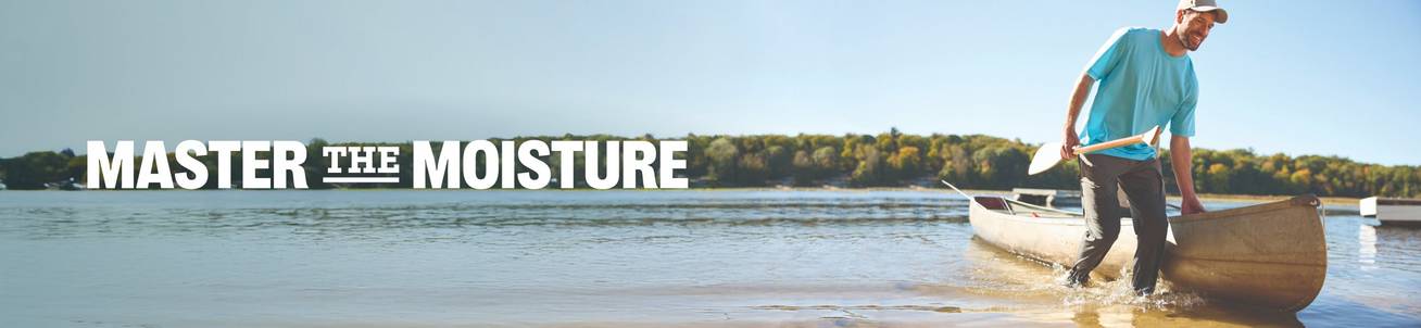 Headline: Master the moisture. A man pulling a canoe out of a lake