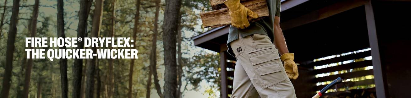Fire Hose Dryflex The Quicker-Wicker-Upper. A man carrying cut wood wearing leather gloves and khaki pants