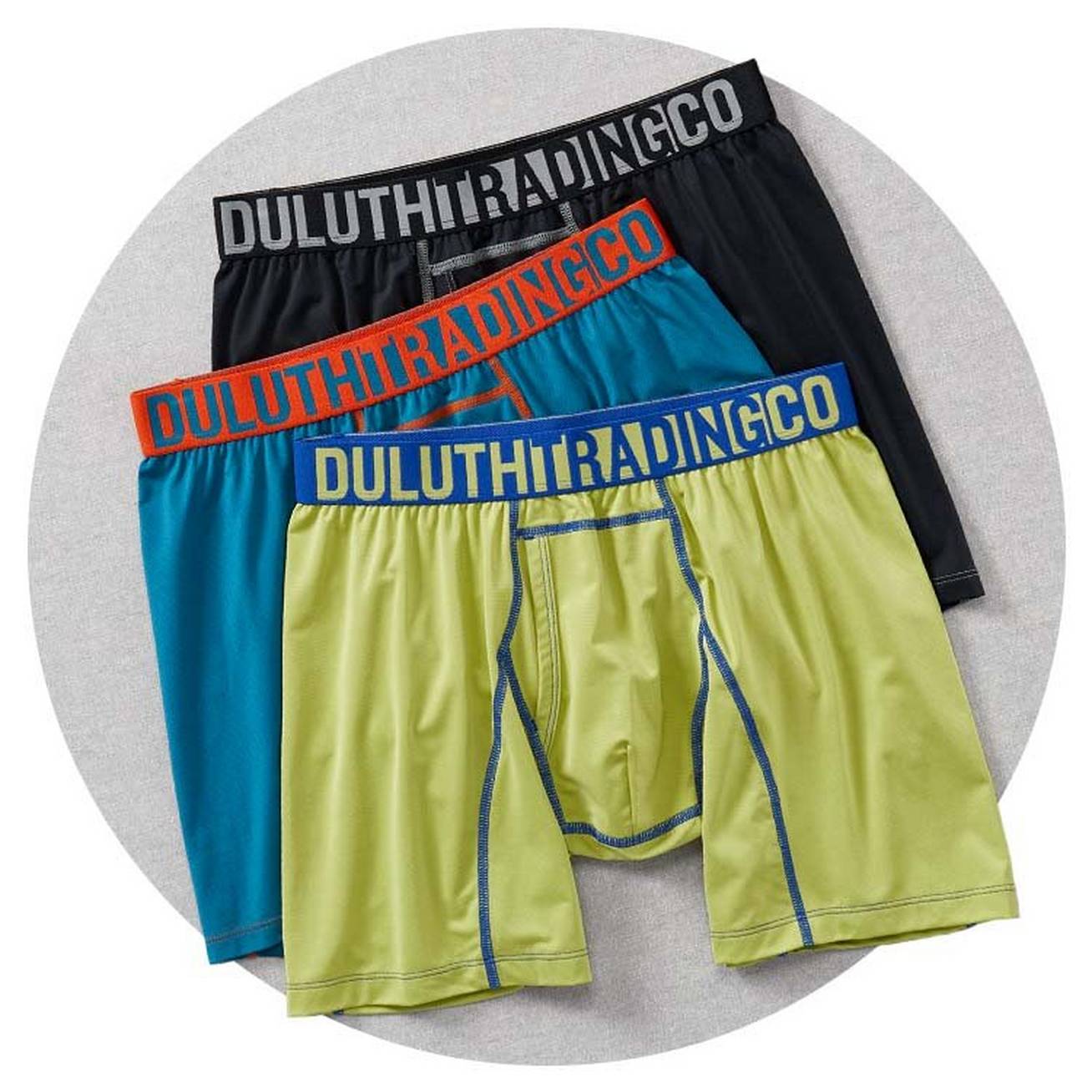 three pairs of men's temp tamer boxer briefs in different colors