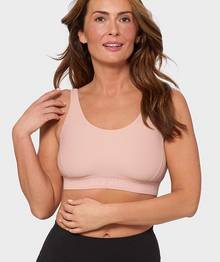 Woman wearing a pink bra.