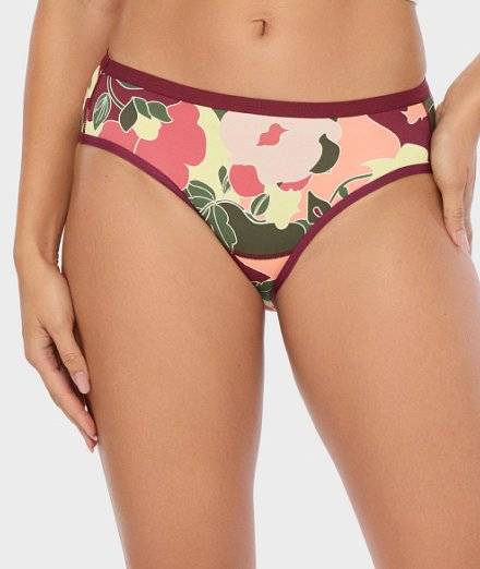 Woman wearing floral patterned hipster underwear.