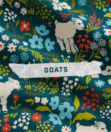 Goats and flowers pattern.