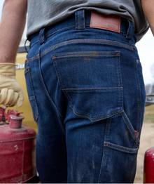 Man wearing blue jeans.