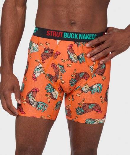 Man wearing rooster patterned boxer briefs.