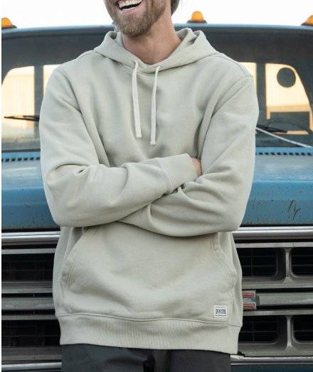 Man wearing a tan hooded sweatshirt.