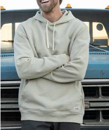 Man wearing a tan hooded sweatshirt.