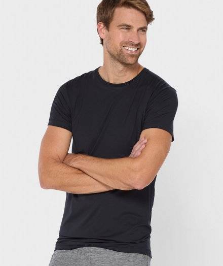 Man wearing a black undershirt.