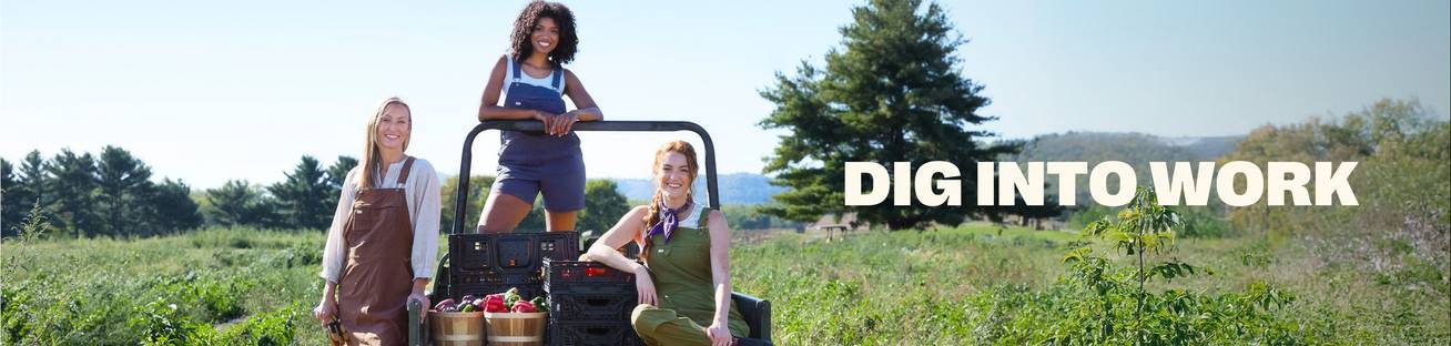 Headline: Dig Into Work. Three women wearing overalls.