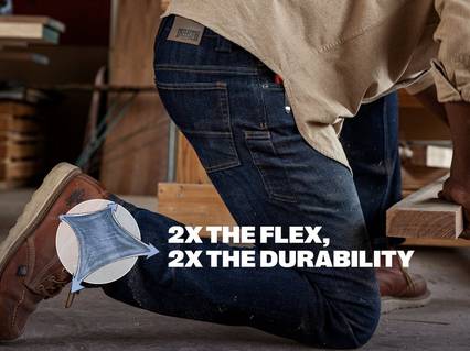 2X the Flex, 2X the Durability. Man crouching in jeans. Doubleflex Denim
