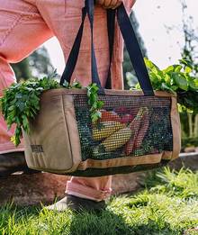 a mesh basket full of vegetables