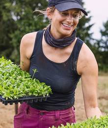 a woman wearing a black tank top