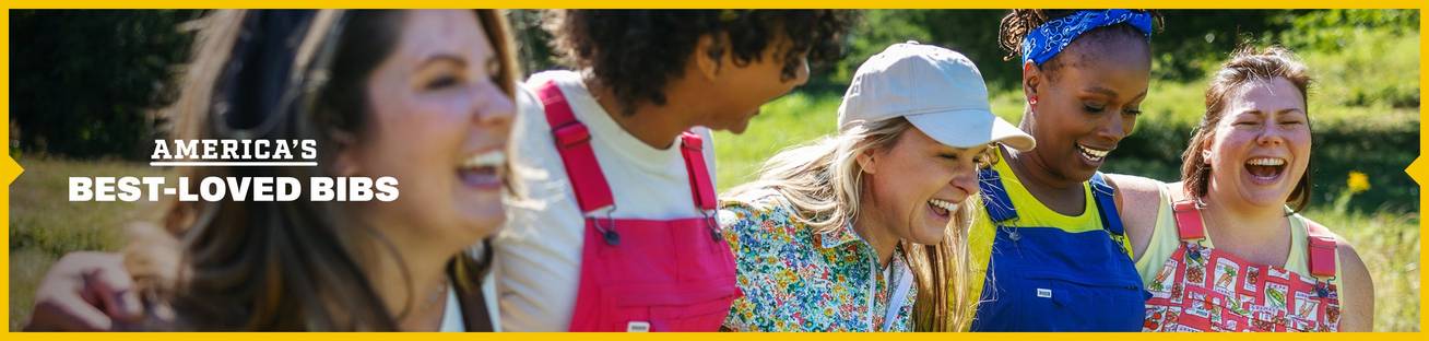 Headline: America's Best-Loved Bibs. A group of women wearing colorful overalls.