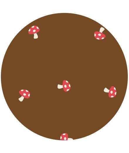 A circle with a brown background and a pattern of small red and white mushrooms