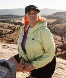 woman wearing akhg olympic coast jacket; hiking in utah