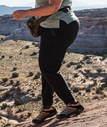 woman wearing akhg pants hiking in Utah