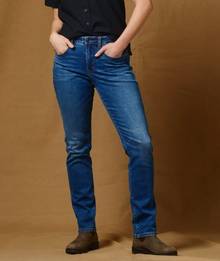 Woman wearing slim leg jeans.