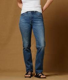 Woman wearing straight leg jeans.