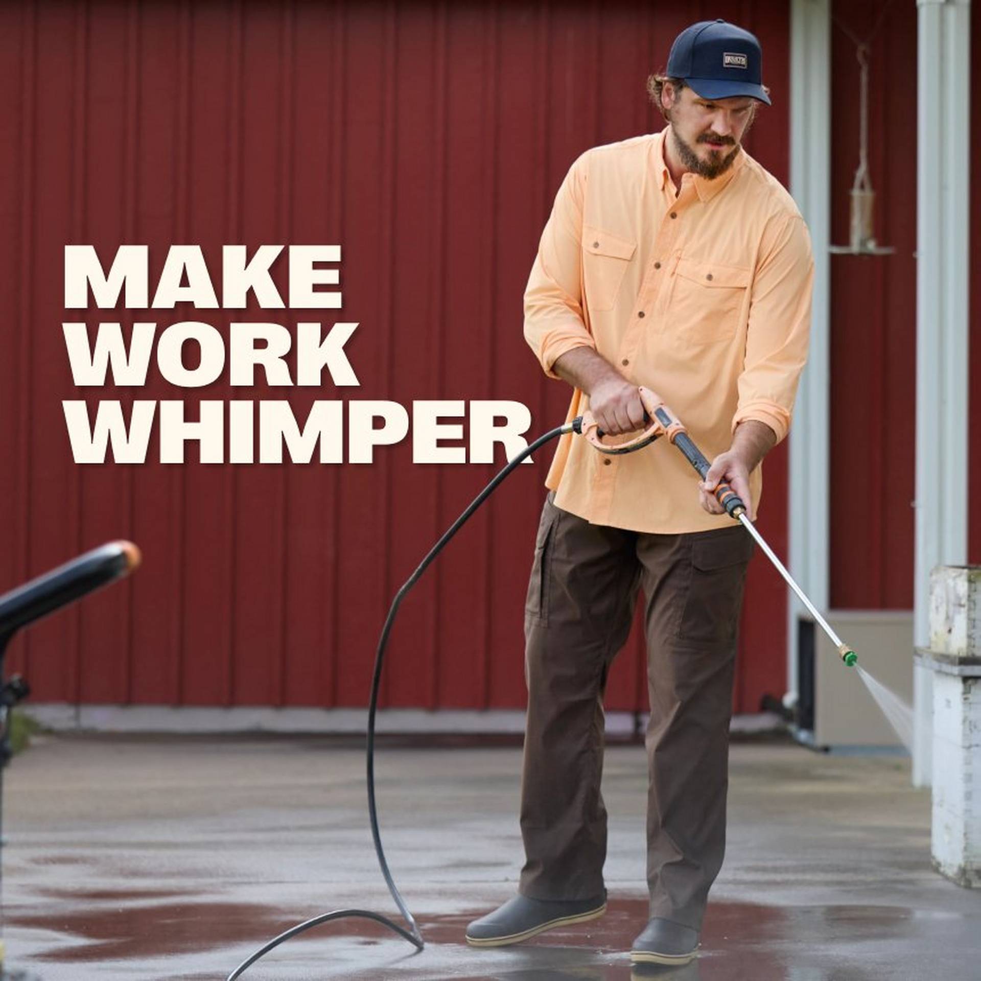 Man power washing driveway.