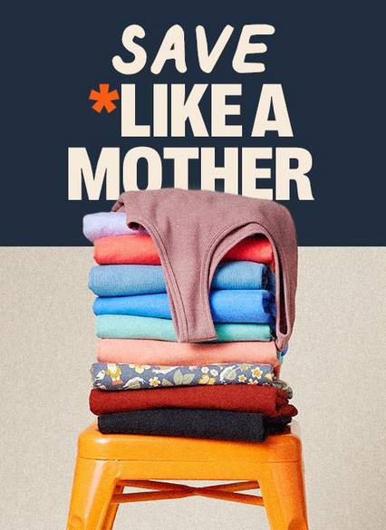 Save Like a Mother | Stack of No-Yank tank tops on an orange stool