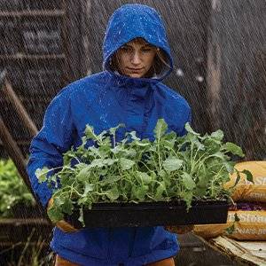 woman gardening in the rain