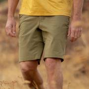 Man wearing tan shorts.