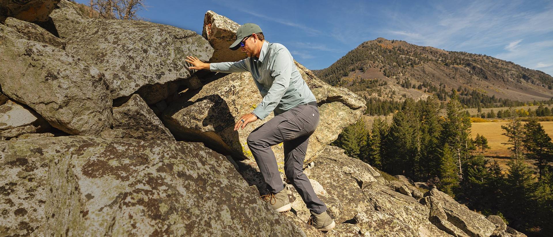 Man hiking on rocks