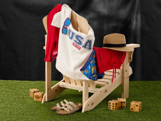 Americana patterned sweatshirt and underwear hanging on chair.