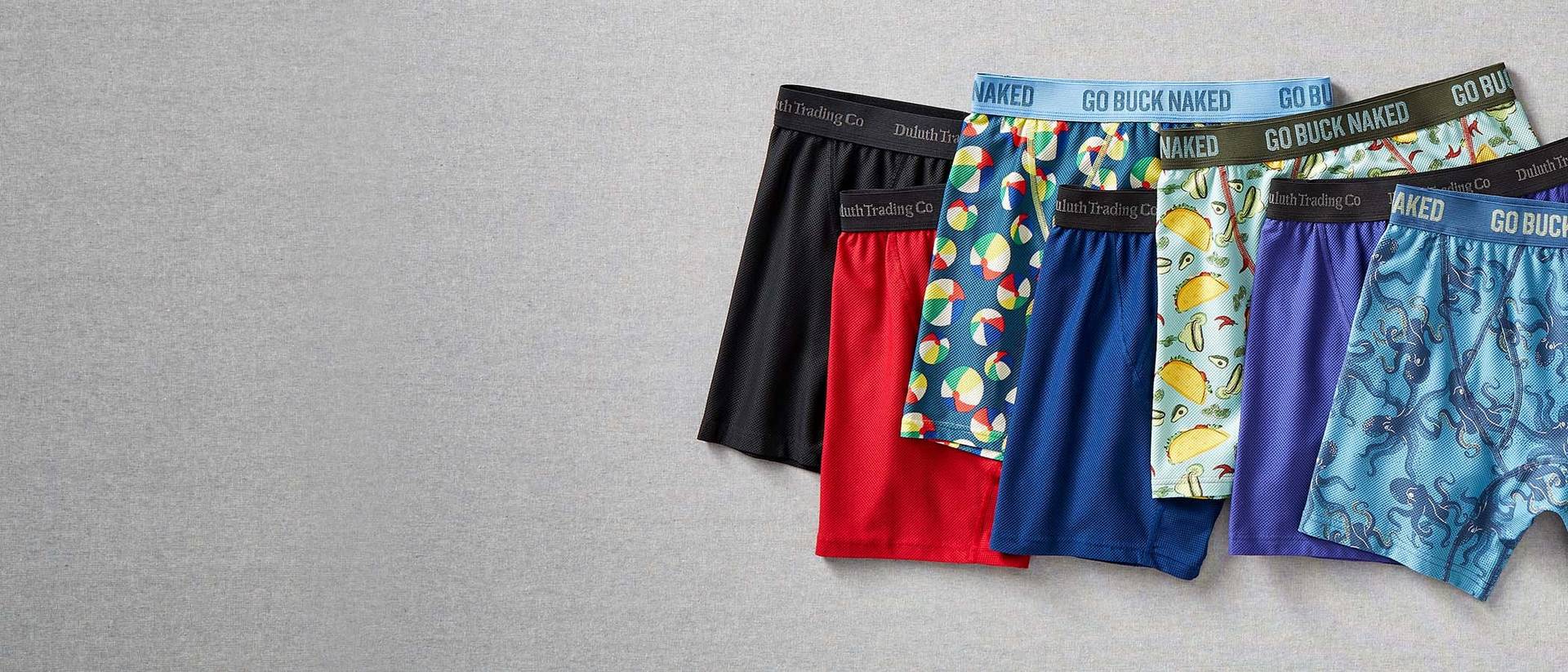 variety of Duluth Trading underwear on a gray background