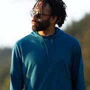 Man wearing blue hooded shirt