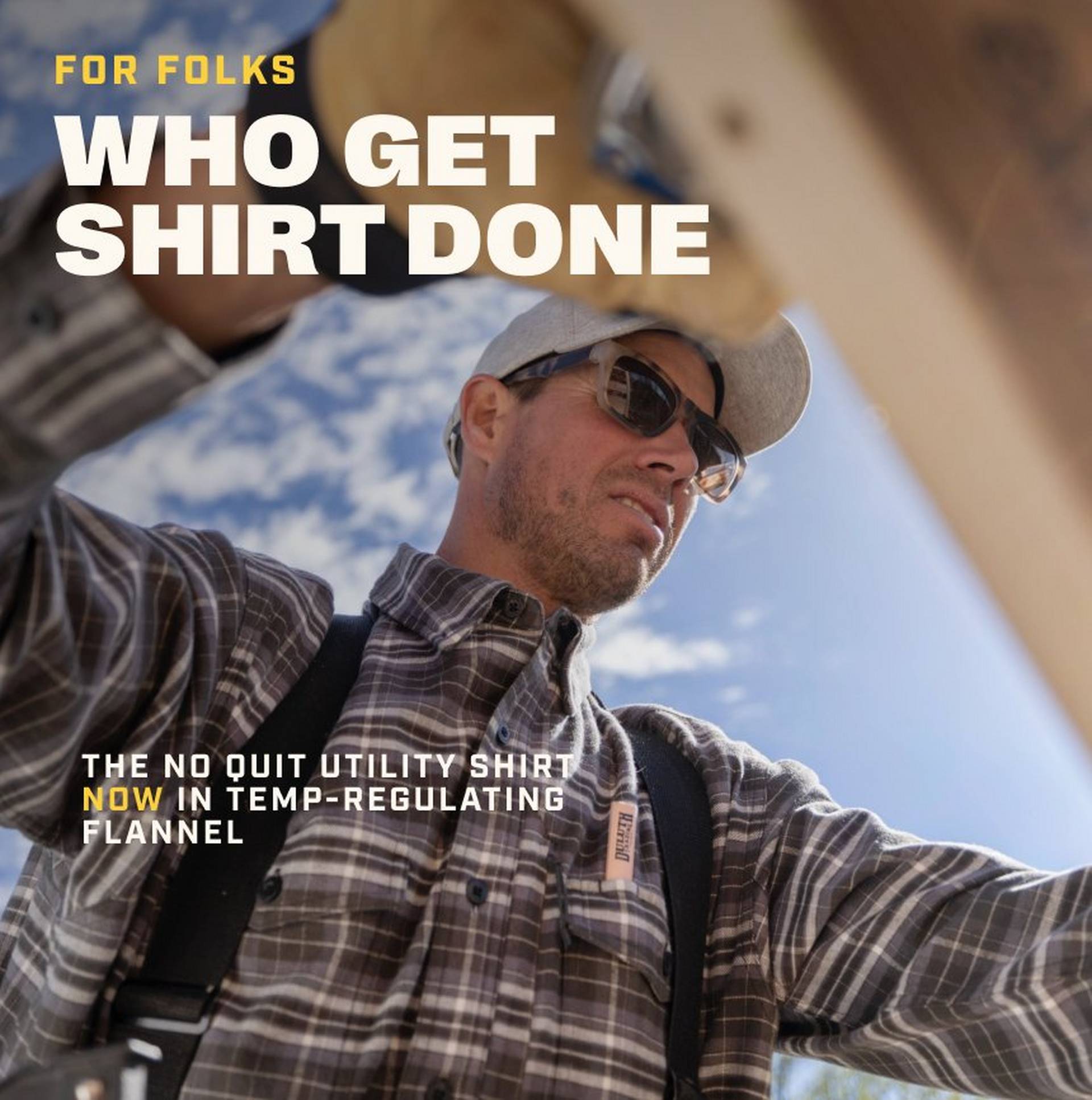 Man wearing a flannel shirt.