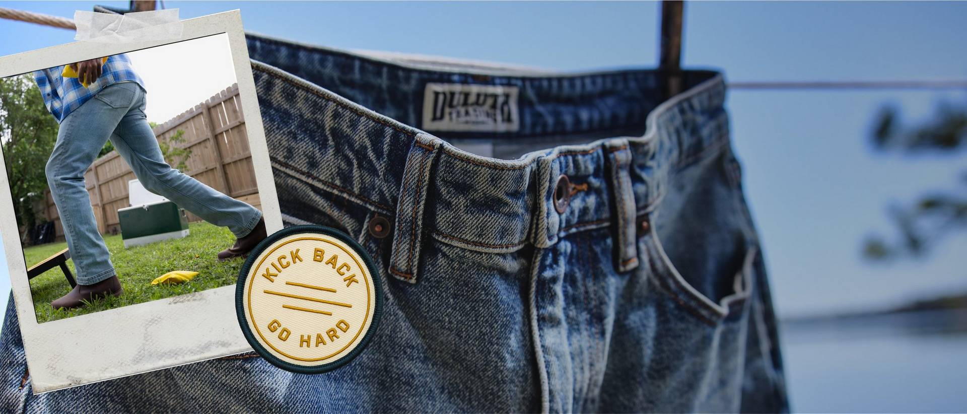 Pair of men's jeans handing on line.
