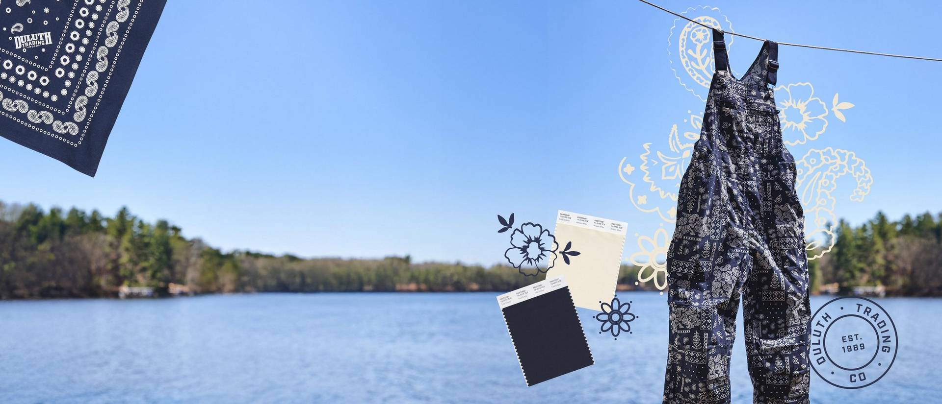 Navy overalls shown over a lake