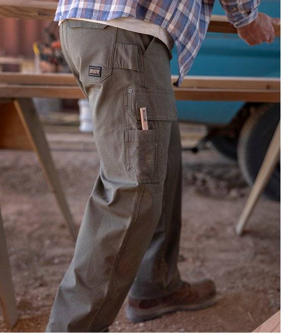 Man wearing grey work pants.