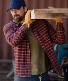 Man wearing red flannel shirt.