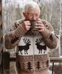 Man wearing sweater with reindeer pattern