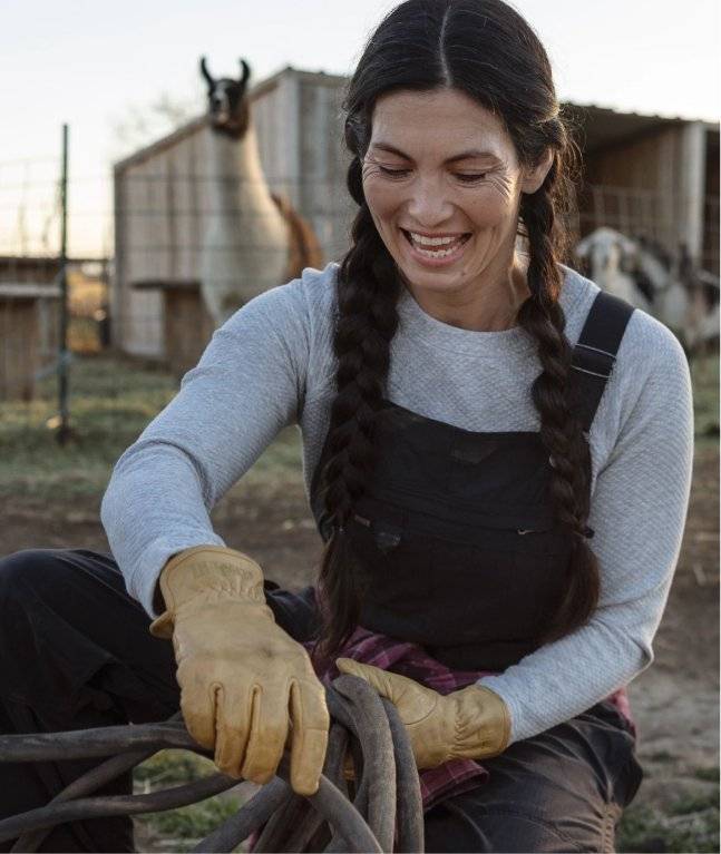 Woman wearing black overalls