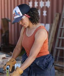 Woman wearing an orange tank top