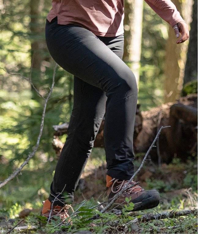 Woman wearing black hiking pants.