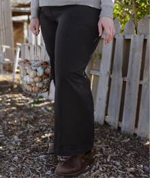Woman wearing black pants.