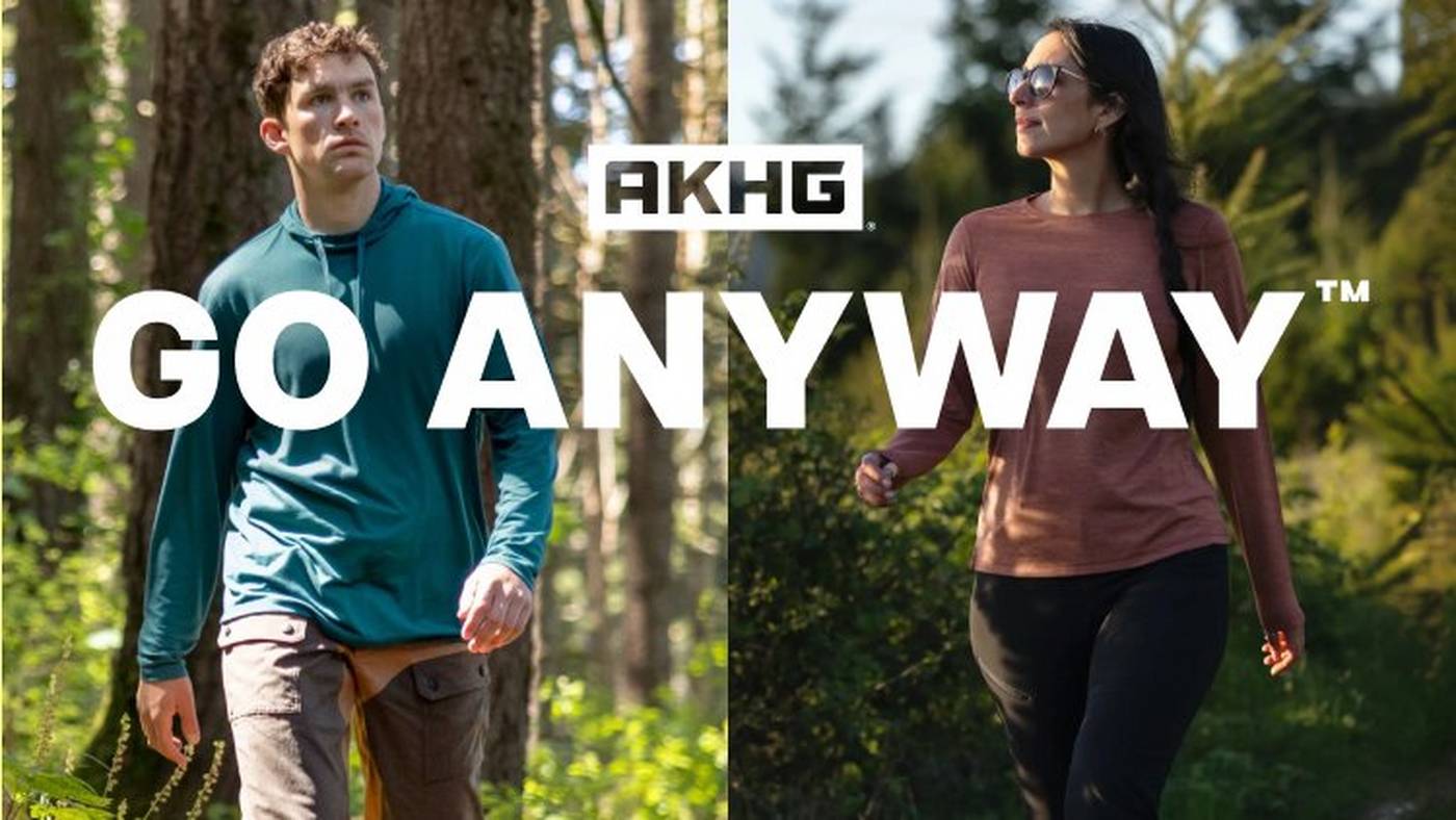 Man and woman walking in a forest